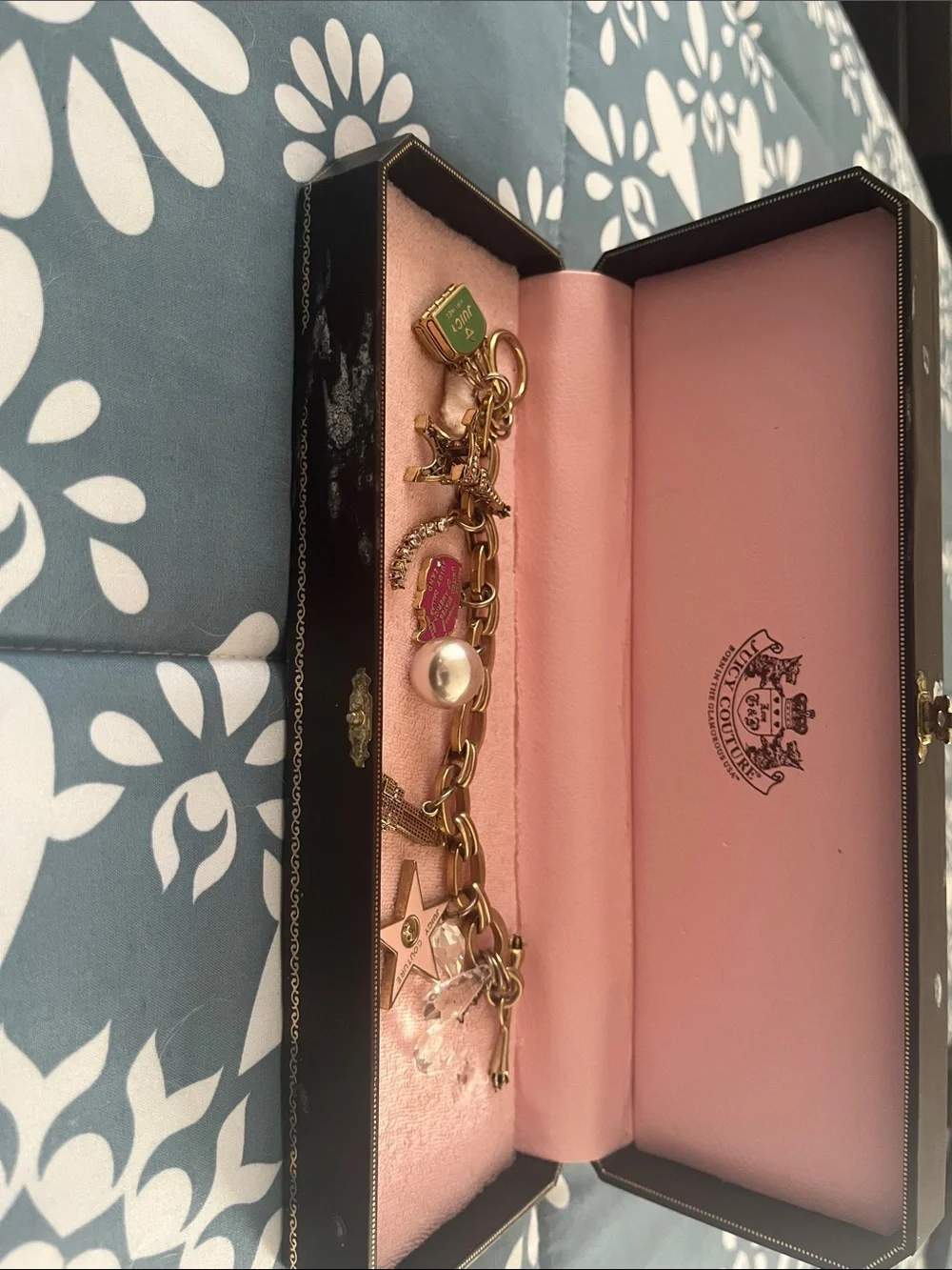Juicy Couture Gold Tone Charm Bracelet with Pink and Pearl Accents